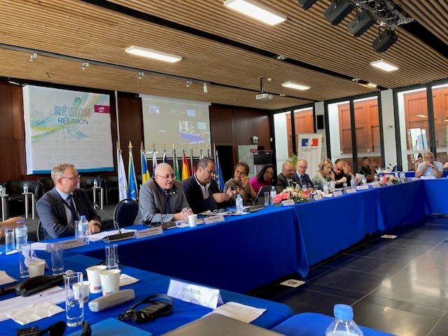 The woman in the pink dress in this photo is Céline Sitouze, the island’s Minister of Education.