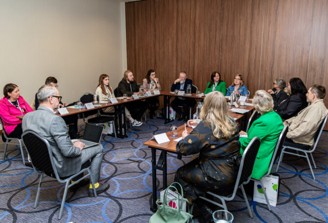 Participants discussing youth guidance and NEET services during the Baltic Sea Network meeting in Kraków.